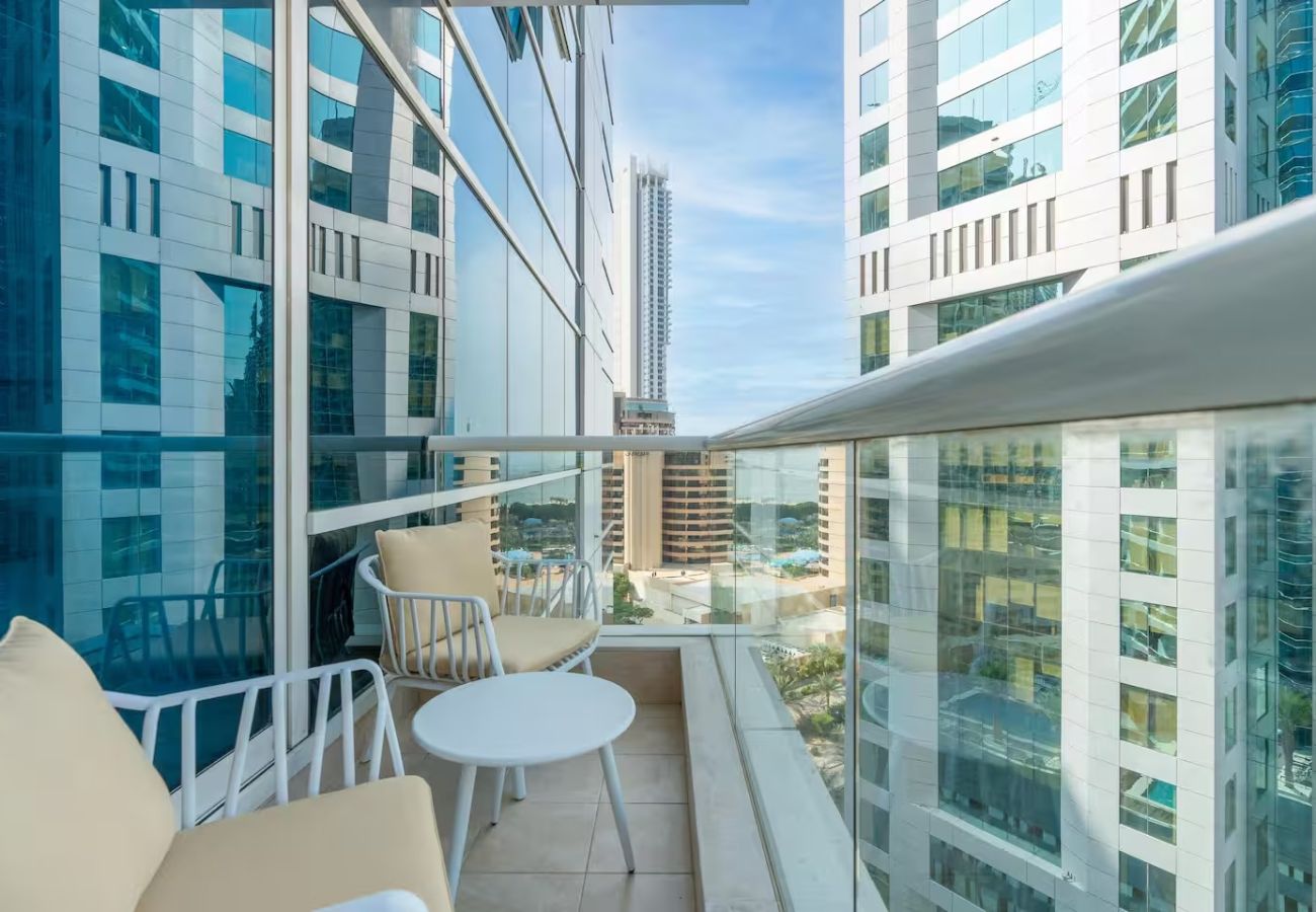 Apartment in Dubai - Stylish 1BR Apartment with Partial Sea View 