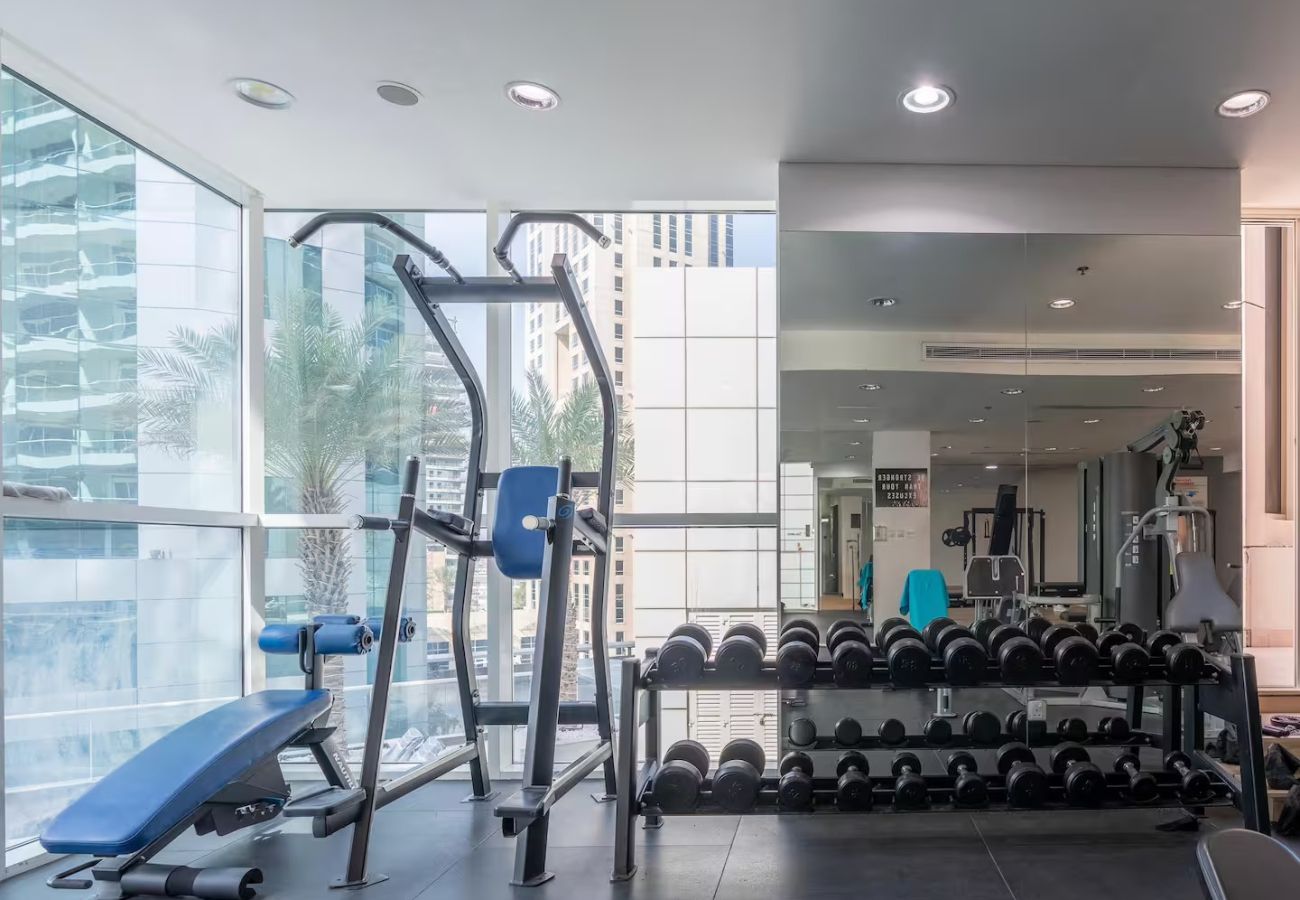 Apartment in Dubai - Stylish 1BR Apartment with Partial Sea View 