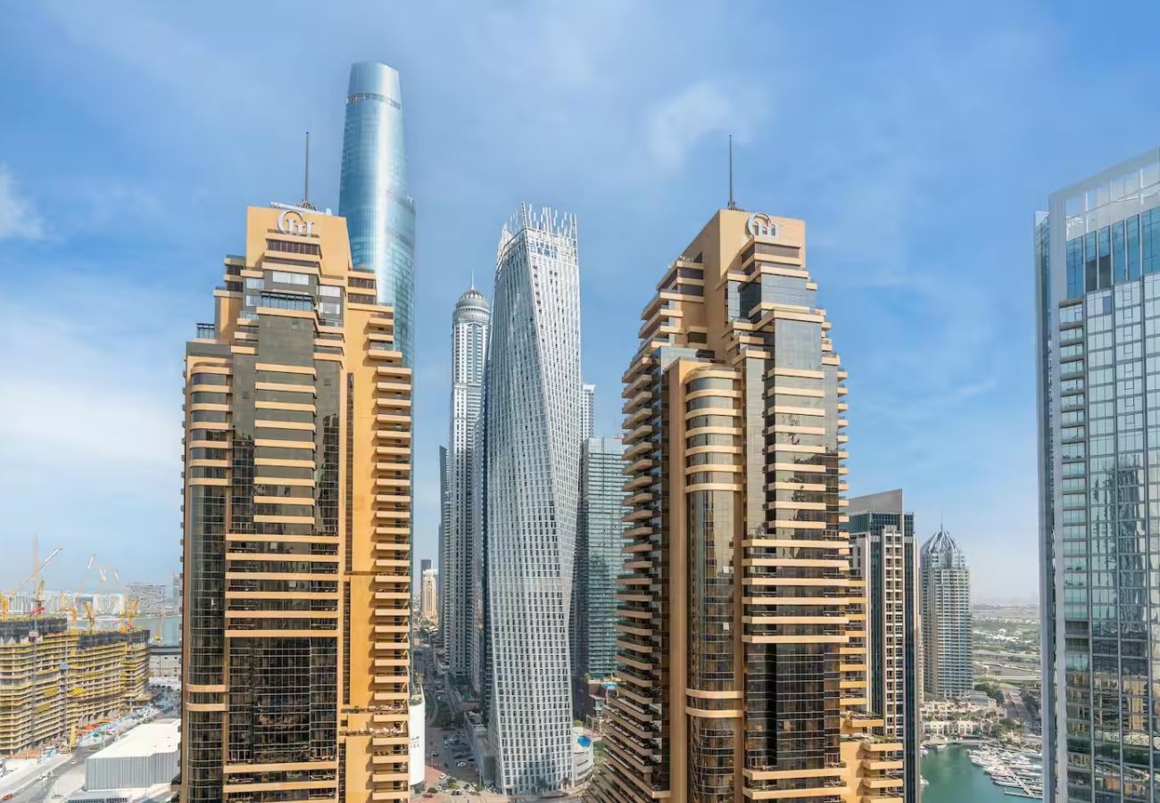 Apartment in Dubai - Stylish 1BR Apartment with Partial Sea View 