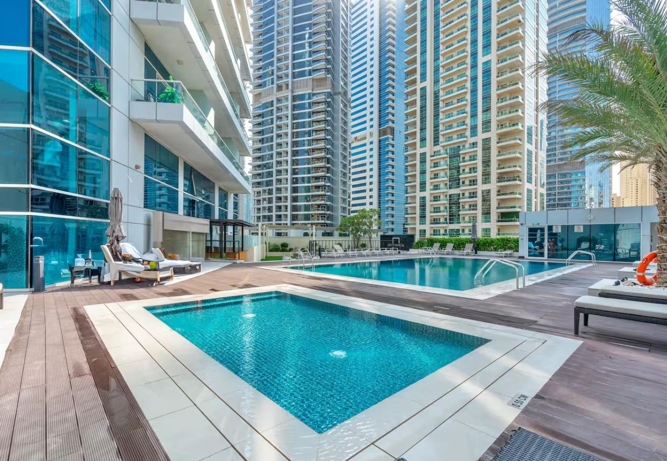 Apartment in Dubai - Stylish 1BR Apartment with Partial Sea View 