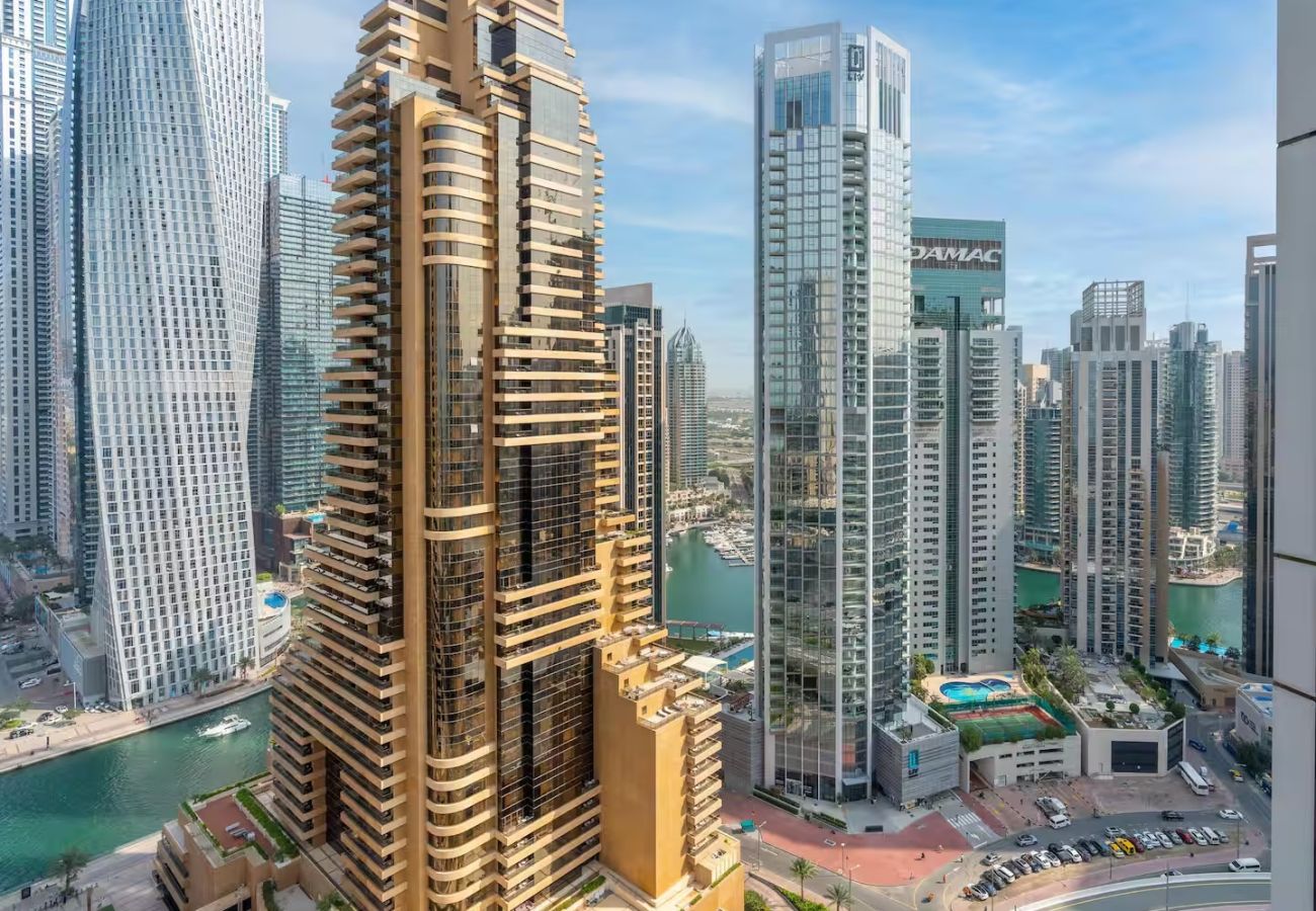 Apartment in Dubai - Stylish 1BR Apartment with Partial Sea View 