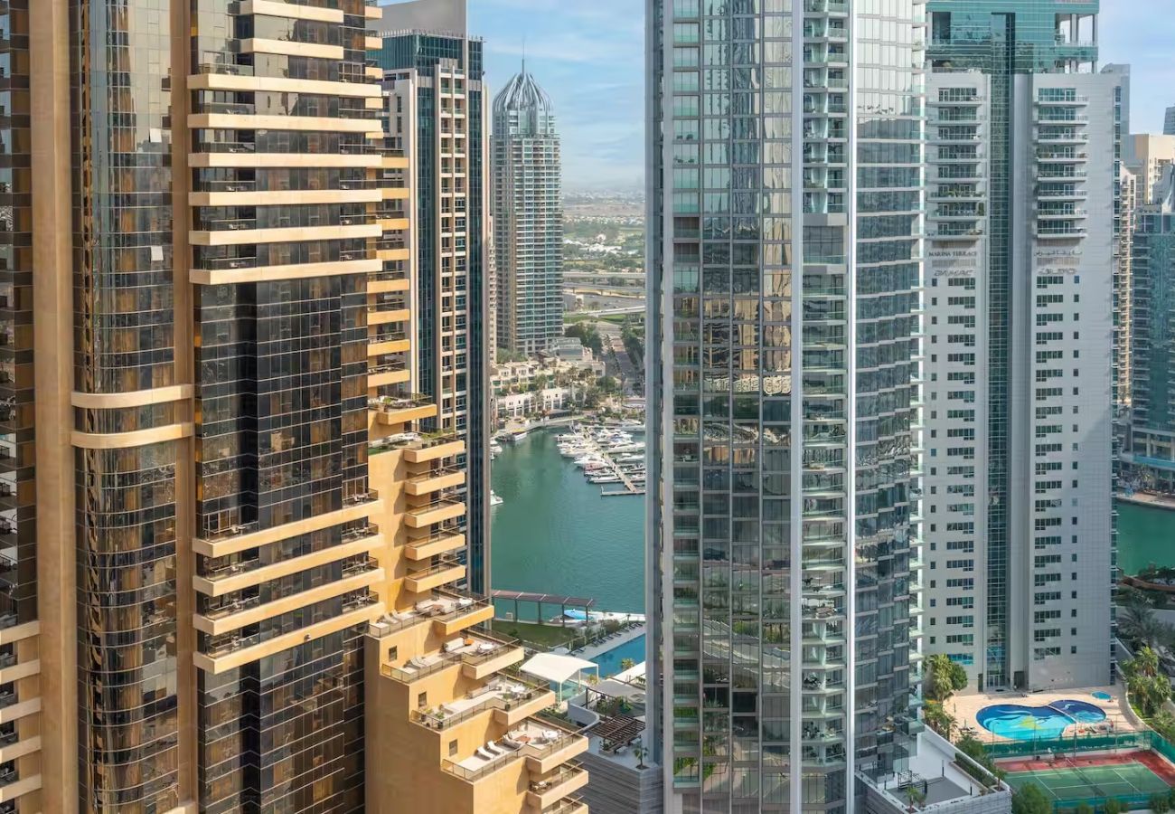 Apartment in Dubai - Stylish 1BR Apartment with Partial Sea View 